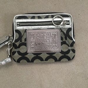 COACH black and silver wristlet
